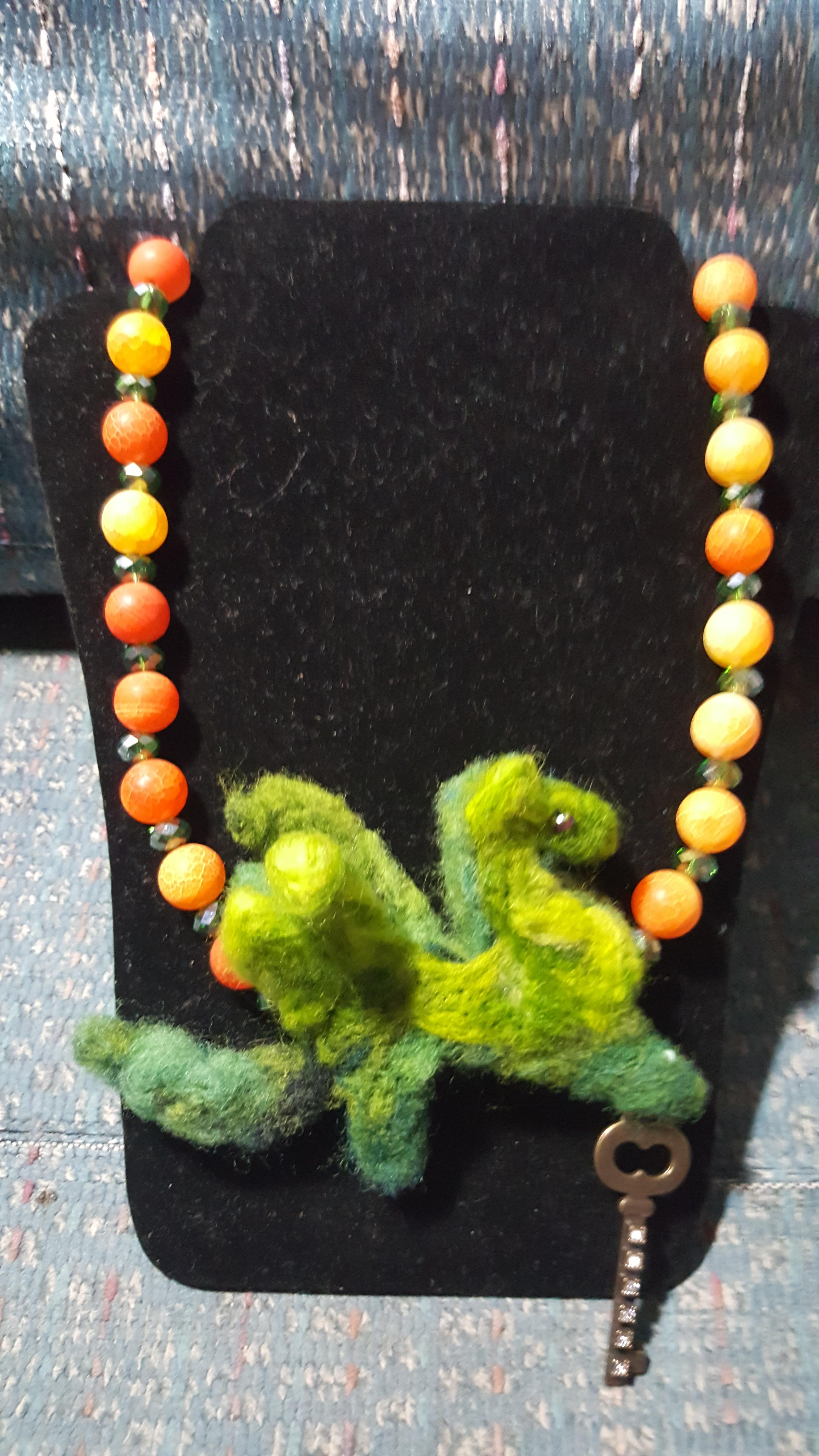 A beaded bracelet with orange and yellow beads