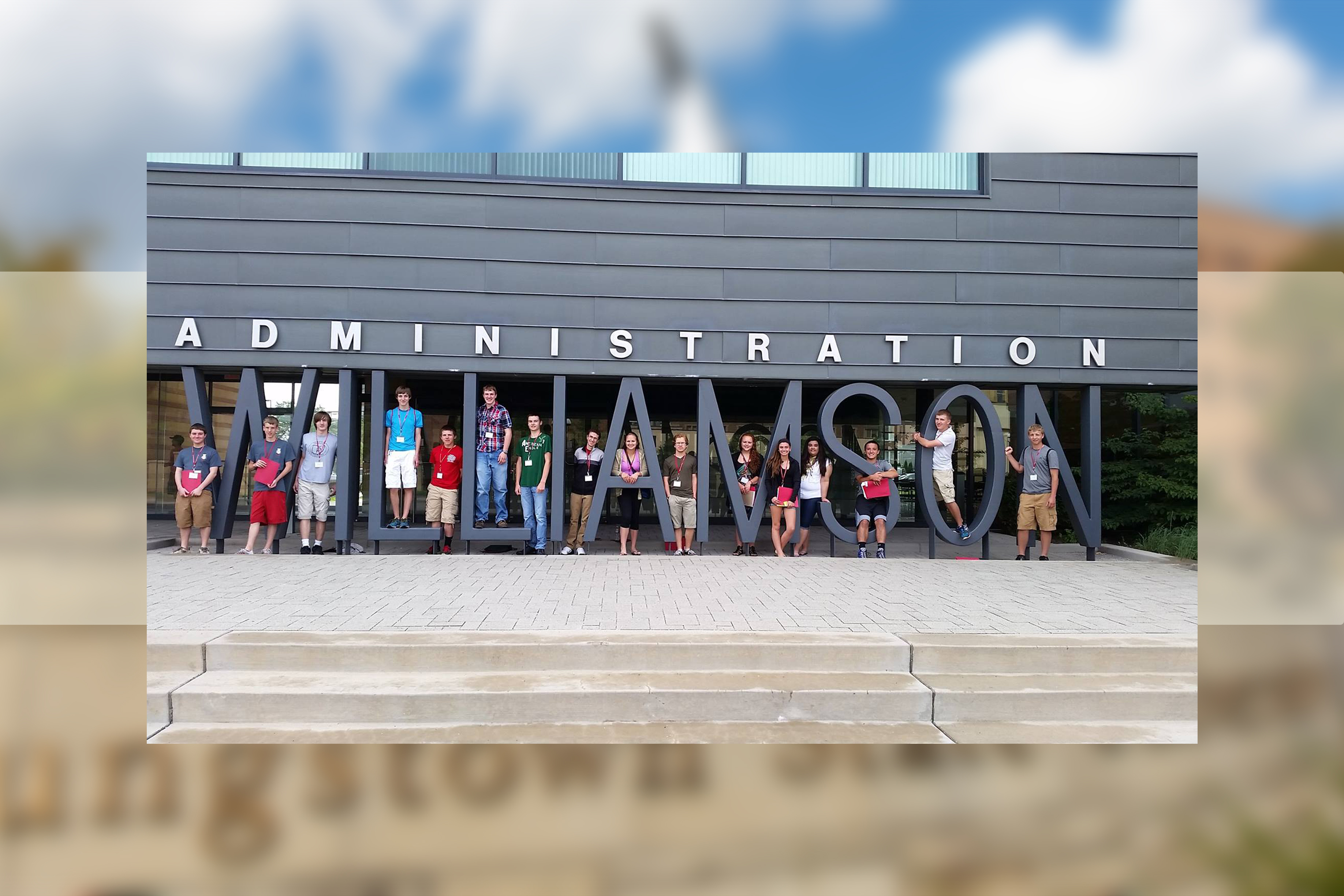 Students from a past Summer Honors Institute pose in front of YSU's WCBA
