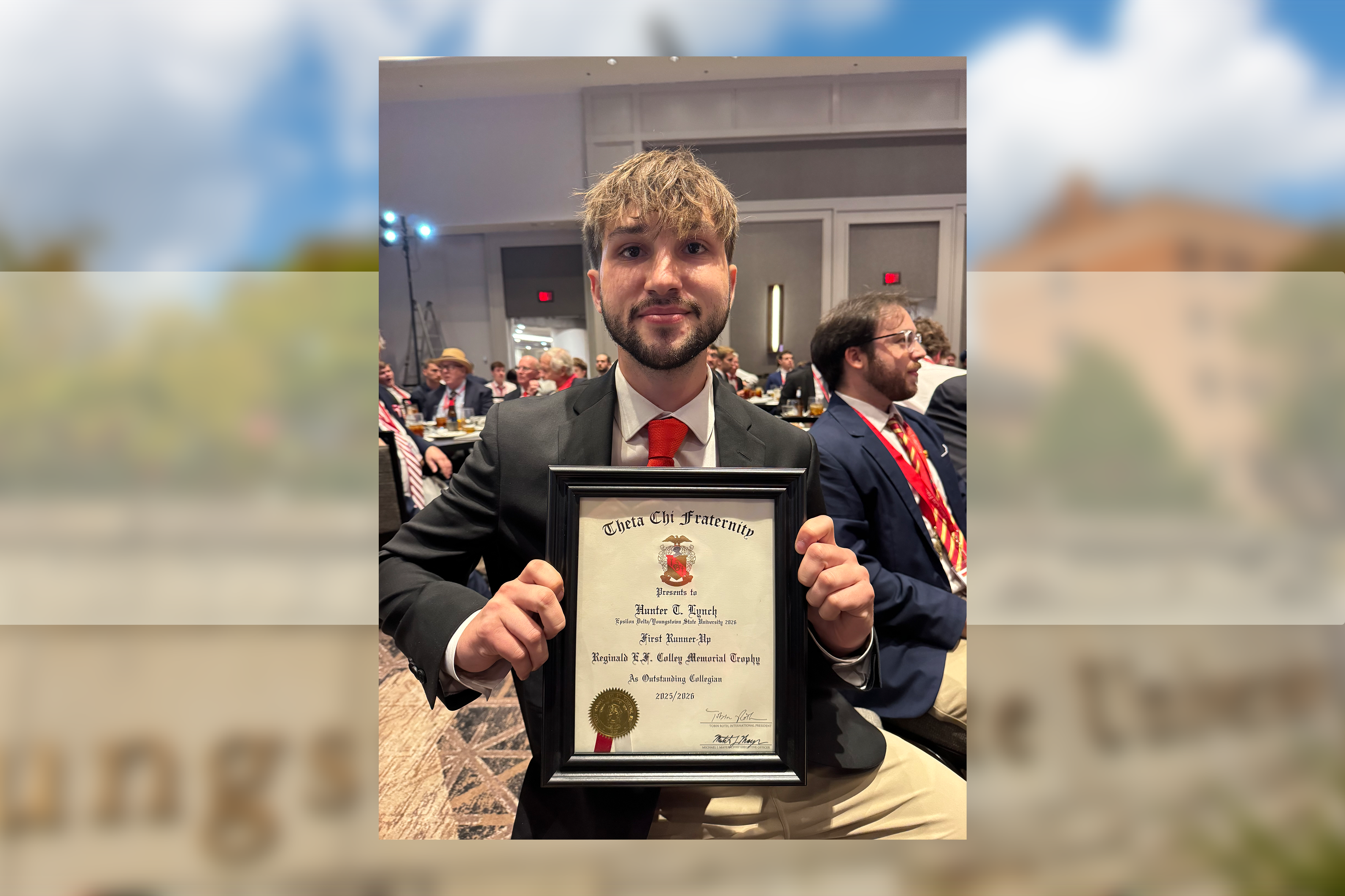 Hunter Lynch poses with his certificate as first runner-up for the Theta Chi Fraternity 2025-26 Reginald E.F. Colley Memorial Trophy