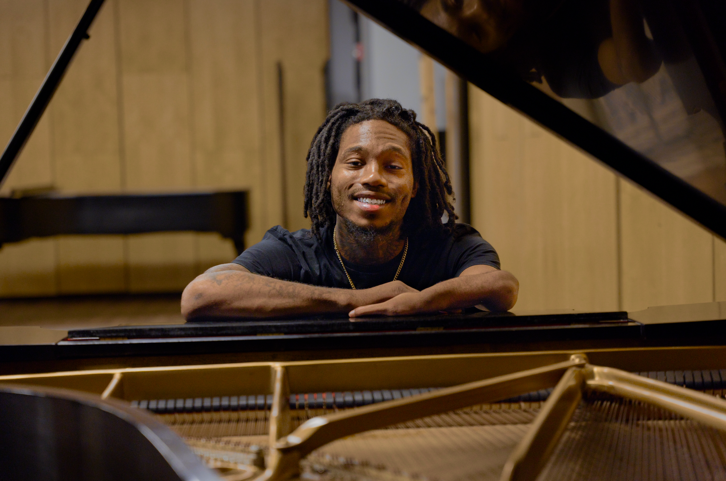 Darrius Simmons sitting at a piano