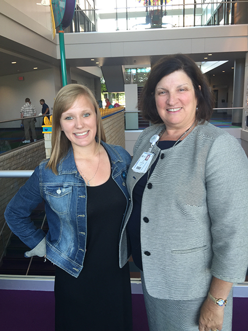 Olivia Millsop, left, with her internship mentor Dr. Elena Rossi, a Youngstown pediatrician