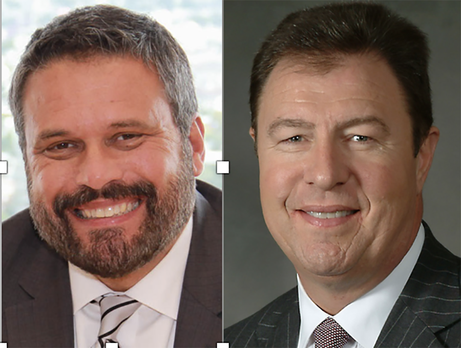 Sam Grooms, chief executive officer of Hy-Tek Material Handling, and Don Lewis, president of Essity’