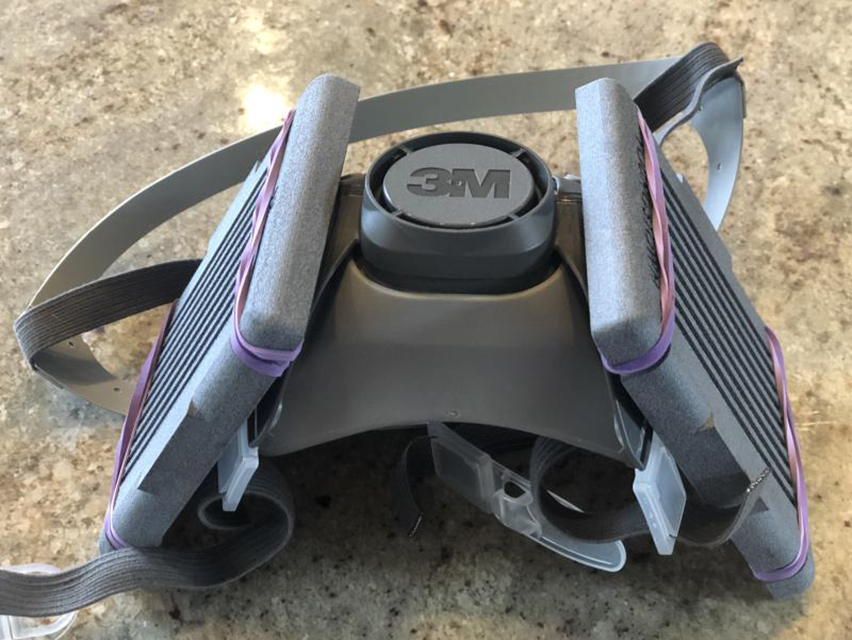 A 3M respirator mask equipped with the 3D-printed filter cartridges designed by YSU faculty.