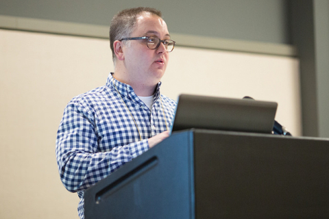 Professor Robert Korenic presenting at a conference in Pittsburgh, Pennsylvania