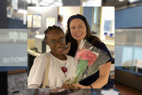 Natasha Nyahalay Sombie receives flowers from a coworker