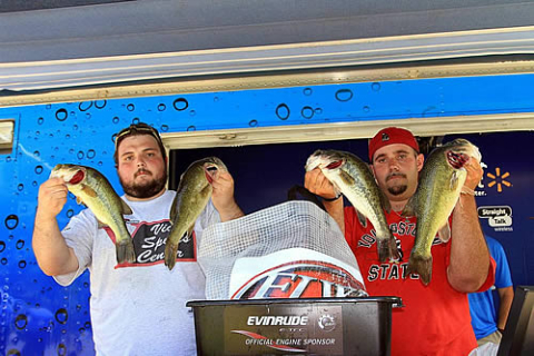 YSU bas fishing club members posing with catch