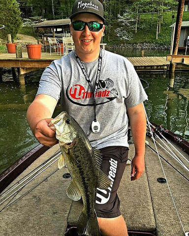 YSU bass fishing club members posing with catch
