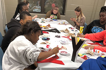 Students showcasing artistic ability