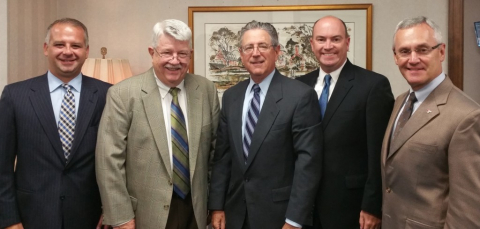 From the left are trsutees of the Andrews Trust Scott Schulick, Paul Williams and Dave Sabine, Youngstown Mayor John McNally and YSU President Jim Tressel. 