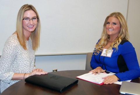 Rikki Batson, senior marketing major, interviews with Andrea Scott, digital coordinator from WEMJ-TV during Internship Interview Day.