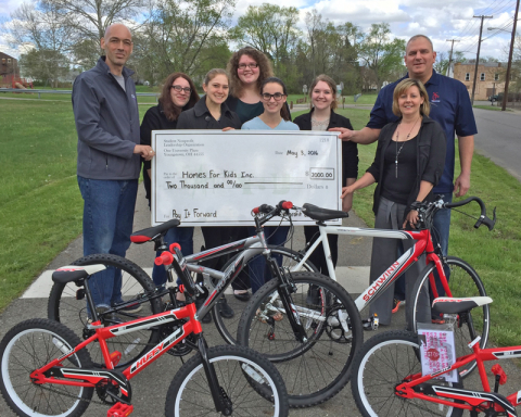 Pictured left to right are Matt Kresic, chief executive officer of Homes for Kids; Andrea Reihard; Leanna Hartsough; Jena Bushongl Emily Young; Tabitha Richmond; Danette Palmer, marketing and development manager for HFK; and Tony Potts, president, Bikes for Kids. 