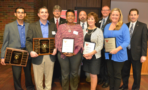 From the left, front row, are Guha Manogharan, Brett Conner, Sherri Harper-Woods, Pat Veisz and Tricia Perry; and back row, Gregg Sturrus, Darrell Wallace, Mike Hripko and Martin Abraham. 