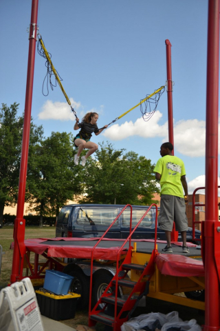 Students using trampoline