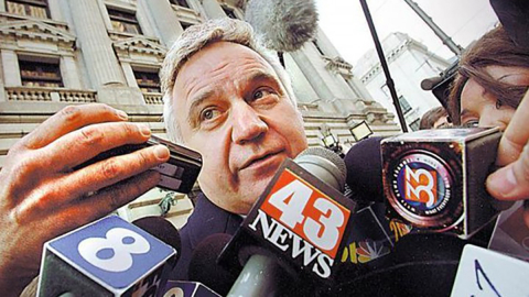 Man being bombarded by news 