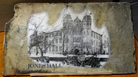 two pieces of slate from the roof saved during the renovation project are now on display in Universi