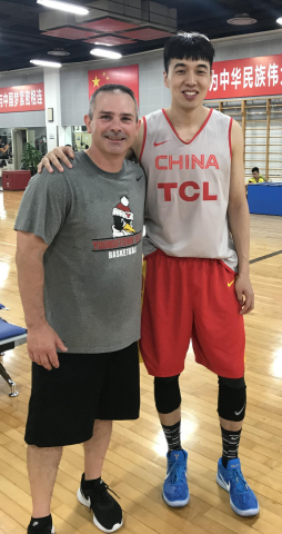 Todd Burkey with Zeng Lingxu of the Chinese national basketball team at the Chinese Olympic Training
