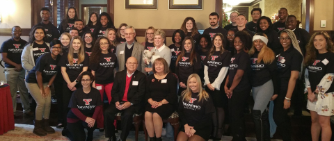 Flor "Shorty" and Elba Navarro, seated front, are pictured with YSU President Jim and Ellen Tressel 