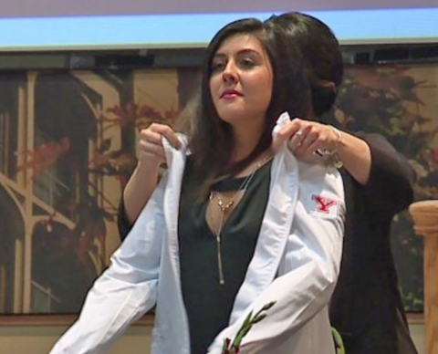 YSU Sophomores receiving their white coats during a ceremony 