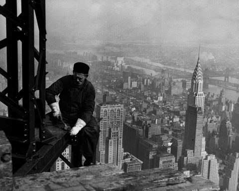 This photo from the National Archives of a worker on the framework of the Empire State Building in N