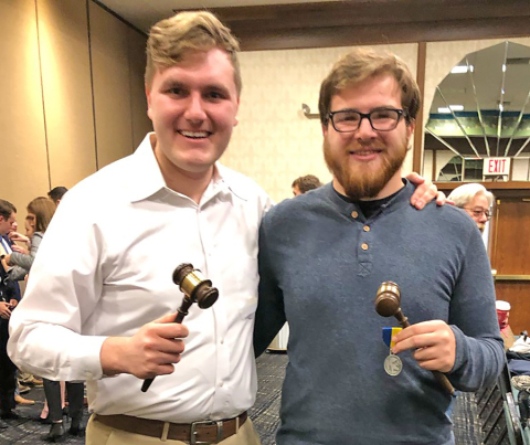 Carson Markley and David Hofsess posing for a picture with their gavel's 