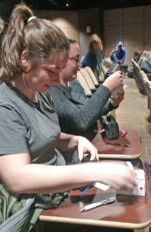 Nursing students receiving training in community-based overdose drug program