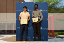 Martin Antonio Lorca and Eric Adomako pose with certificates of achievement